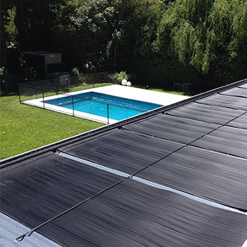 Ecosun solar pool heater installed on roof of residential home